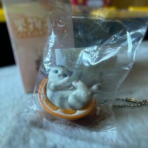 Qualia Fruit Cat Mascot Keychain – Orange Slice • NEW (Opened Box)
